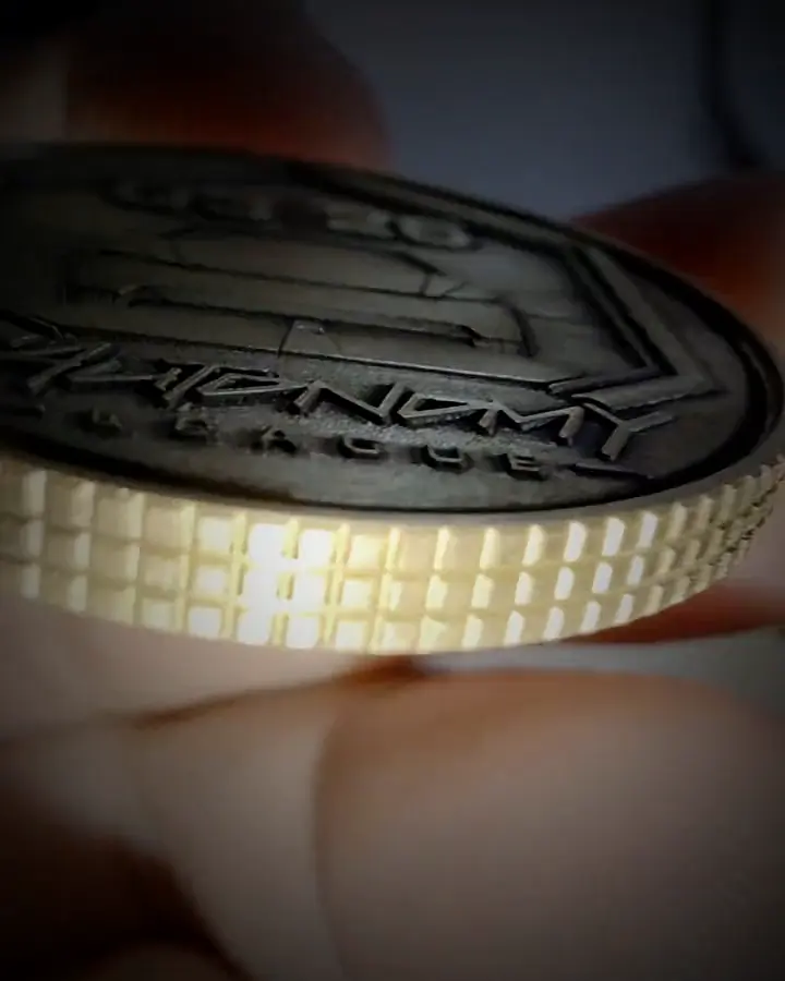 Coin edge with reeding